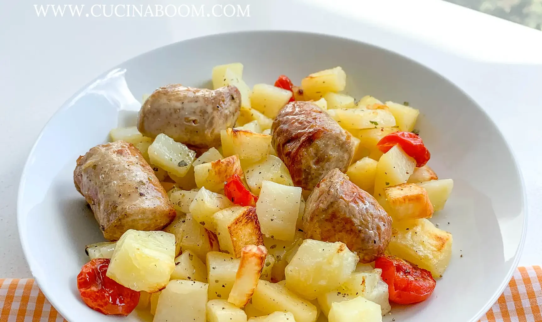 potatoes with sausages cooked in oven